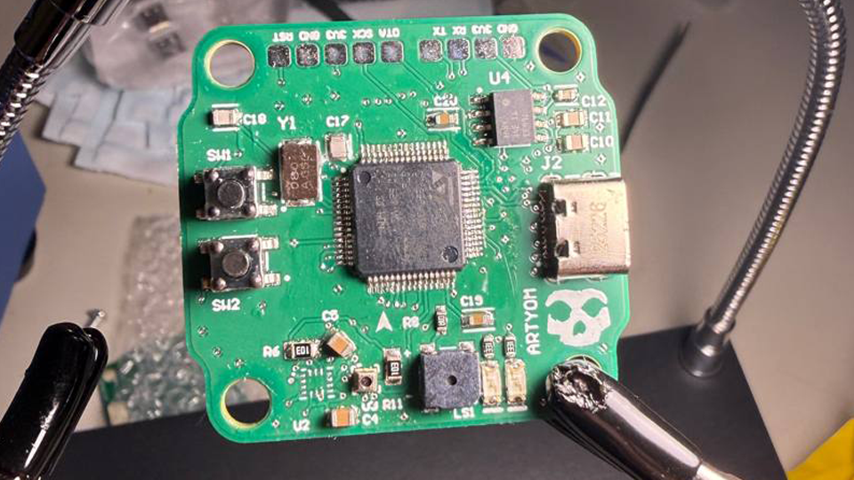 All twelve layers of the flight controller laid over each other, white on black
